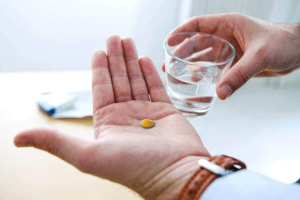 Man takes tadalafil medicine